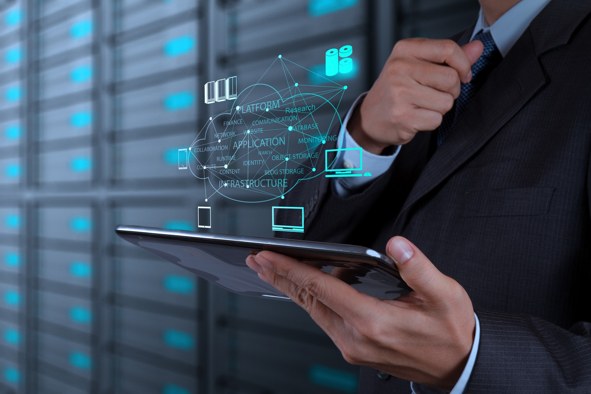 Man holding a tablet with cloud infrastructure